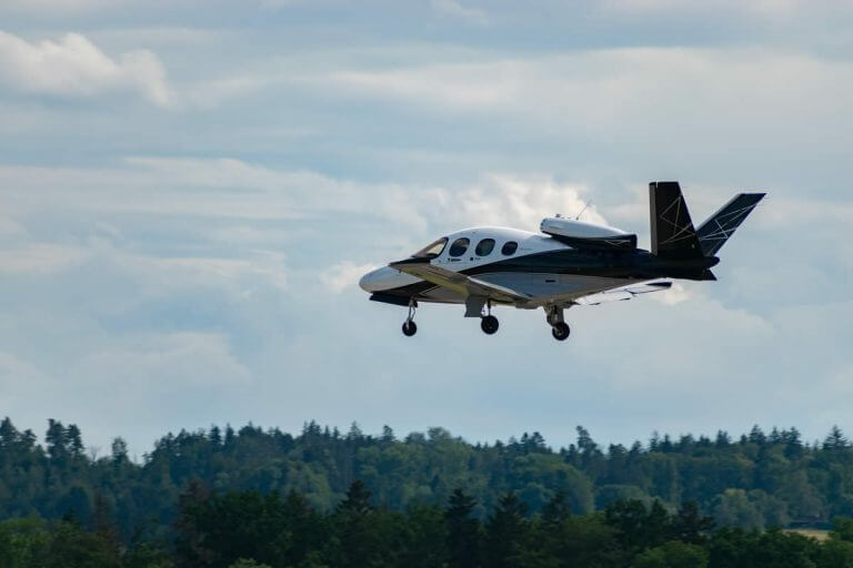 Cirrus Vision Jet on approach with landing gear extended