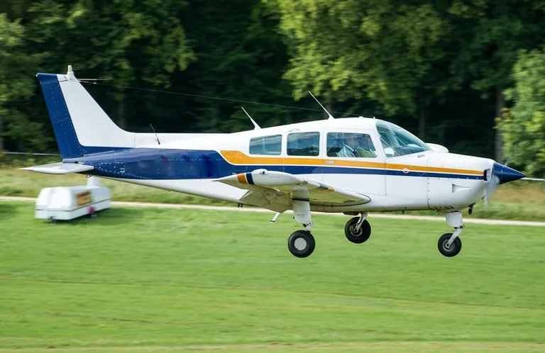 Beechcraft C23 Sundowner aircraft in flight