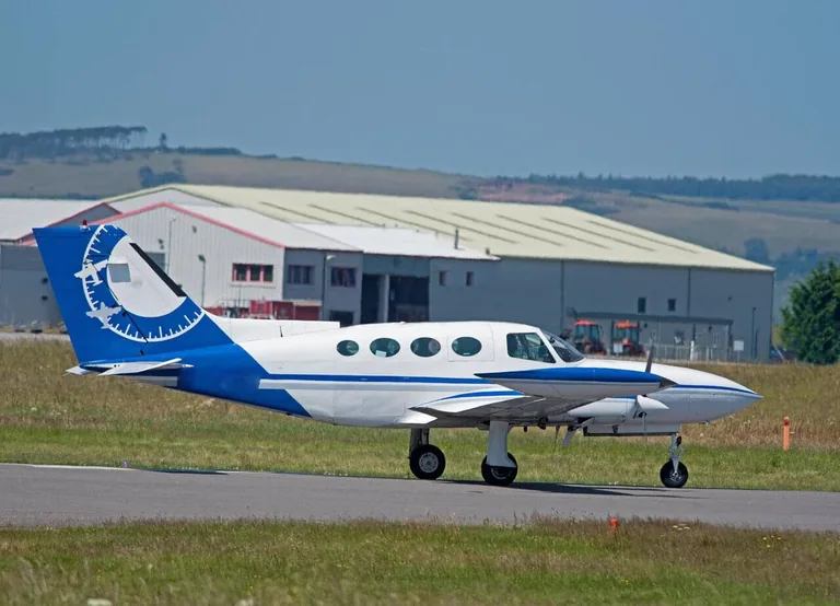 Cessna 402B aircraft at an airport