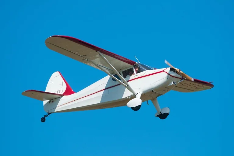 Stinson 108 aircraft in flight