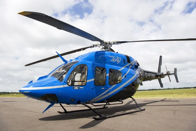 Bell 429 helicopter parked on an apron