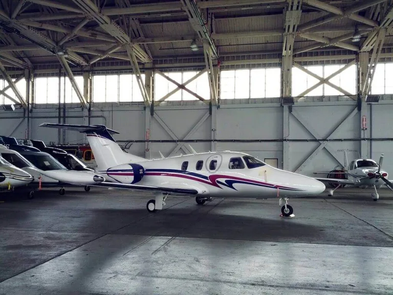 Eclipse 500 business jet inside a hangar