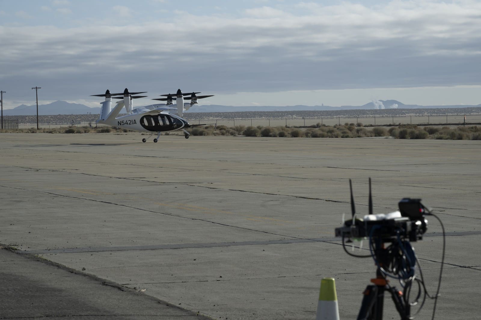 NASA sensing ground node with a Joby experimental aircraft in the background at Edwards California