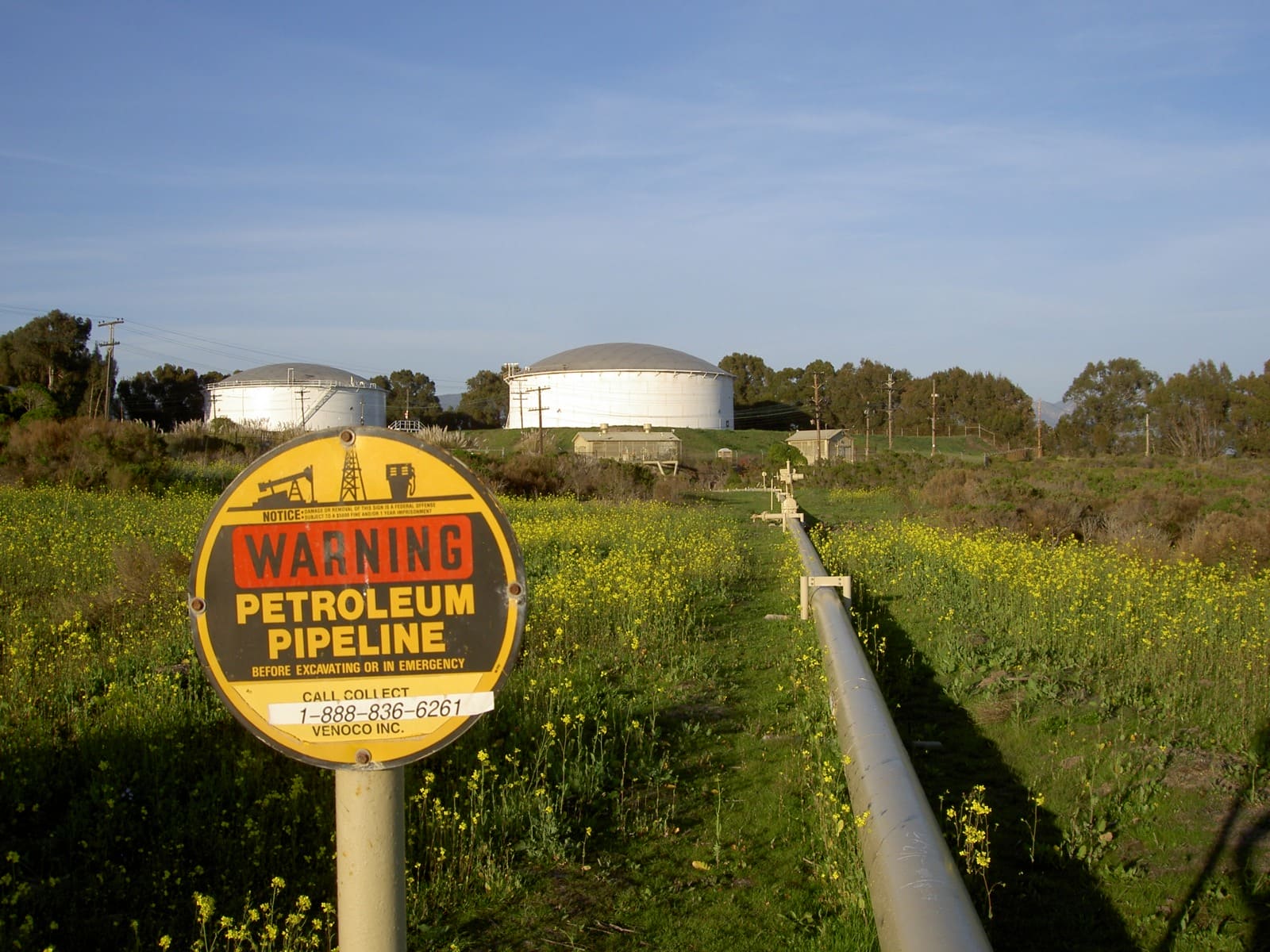 Oil storage tank exteriors at Ellwood Beach in California