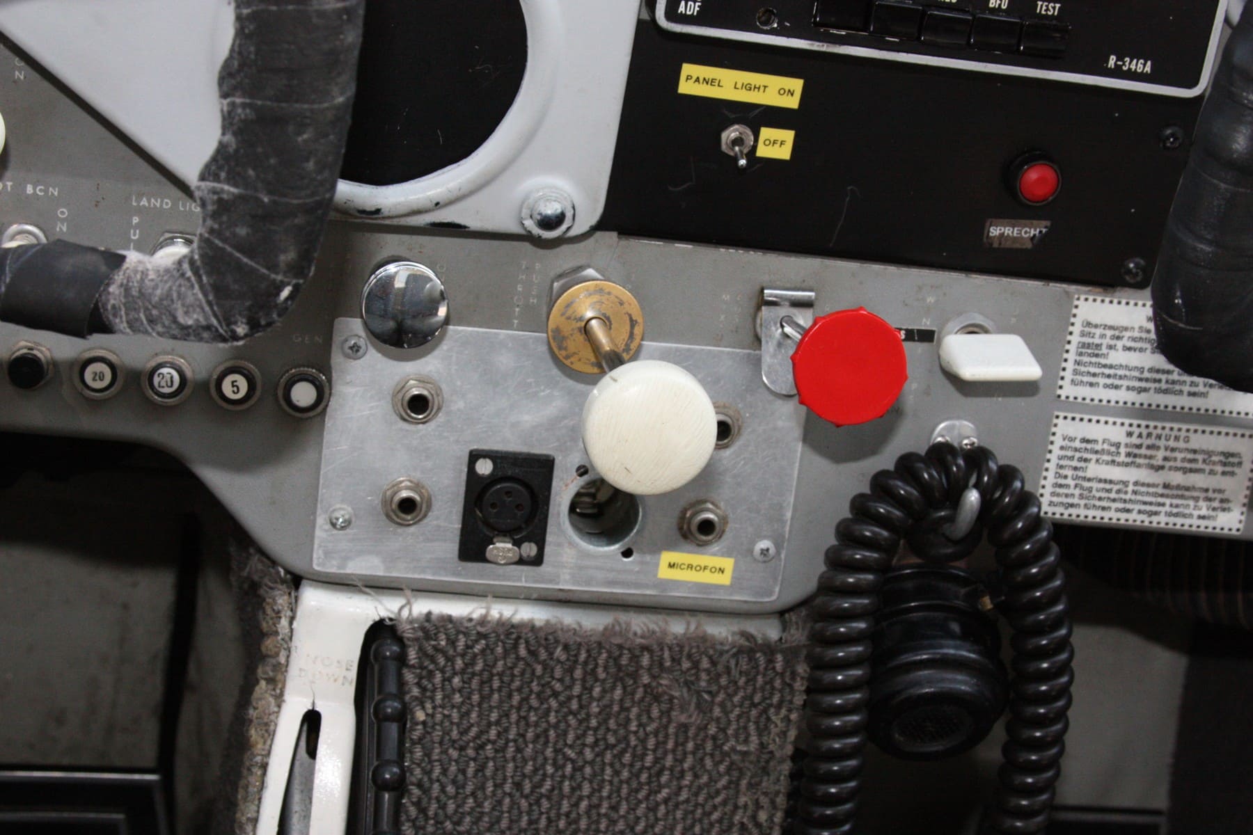 Historical Cessna 172 cockpit control and microphone panel detail