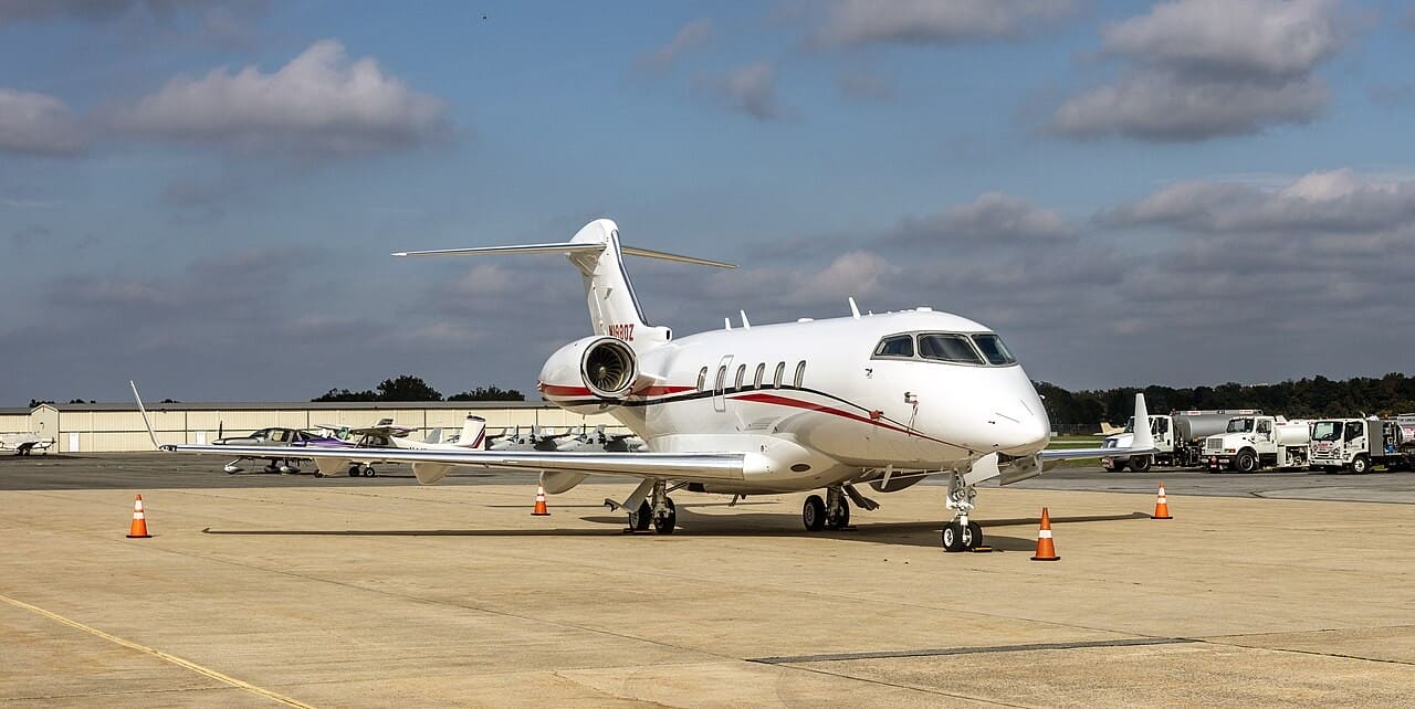 Bombardier Challenger 350 parked on an airport apron