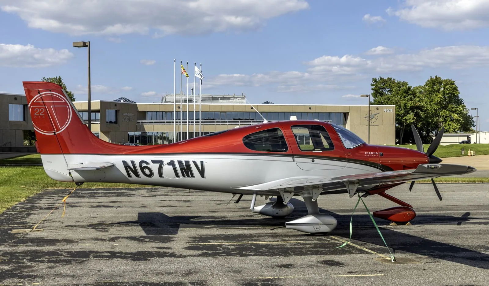 Cirrus SR22T N671MV parked on an airport ramp